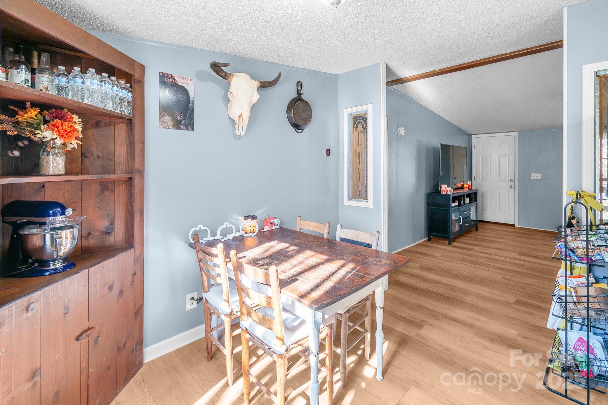 2214 Sojourn Road Marshville, NC 28103 - Photo 9 of 48 a dining room with furniture and window