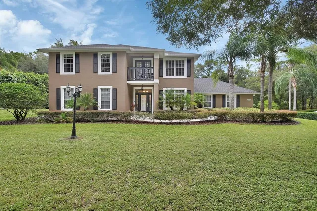 a house with garden in front of it