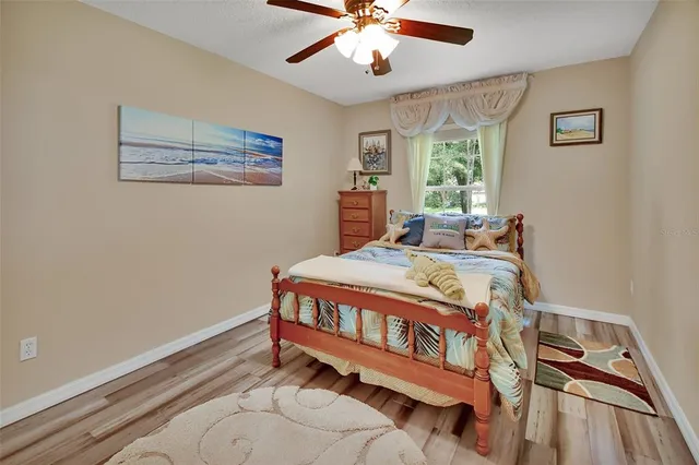 an aerial view of a house with outdoor space and street view