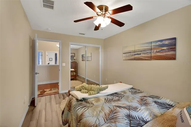 an aerial view of a house with a garden and swimming pool