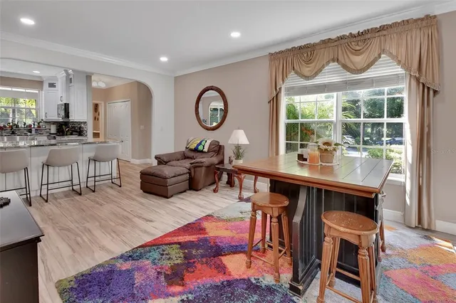 a kitchen with stainless steel appliances a refrigerator stove and microwave