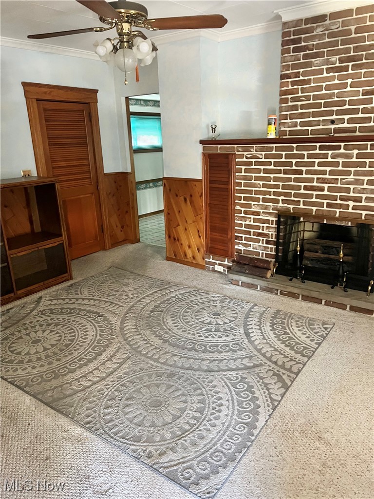 11410 Granger Road Cleveland, OH 44125 - Photo 6 of 27 Family room with faux fireplace