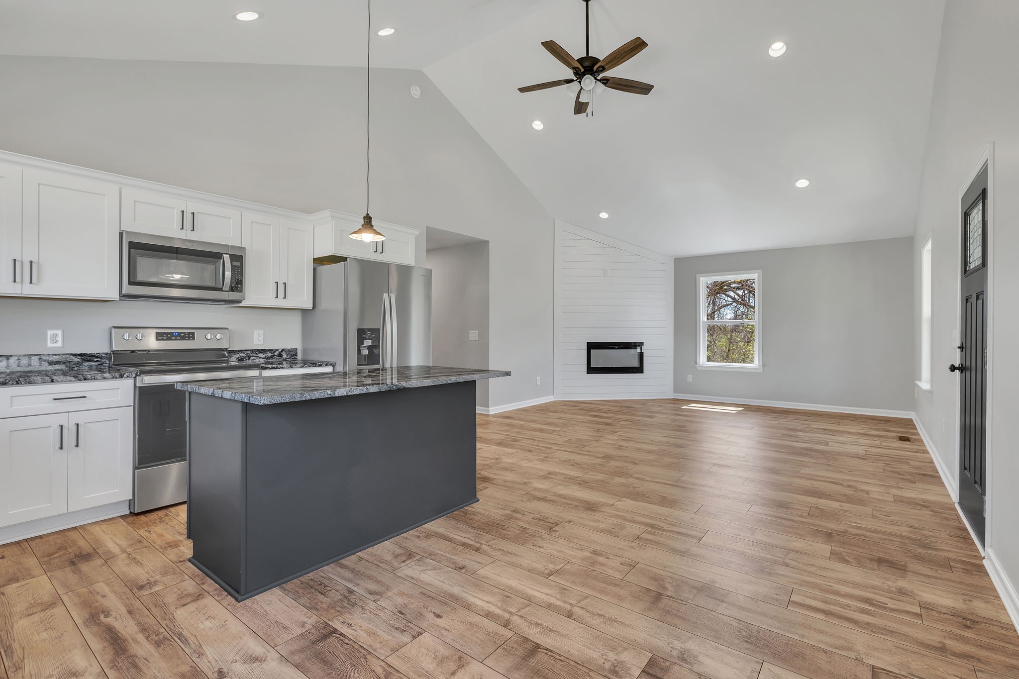 127 Lock 6 Road Hartsville, TN 37074 - Photo 19 of 35 a kitchen with kitchen island a counter top space appliances and cabinets