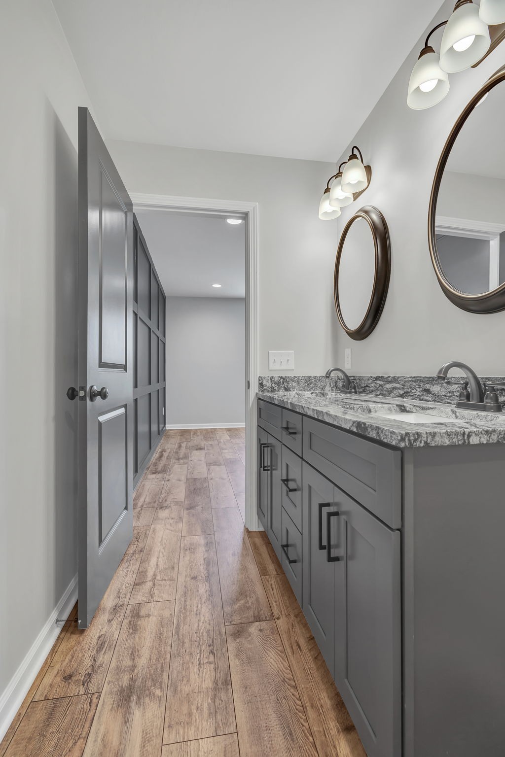 127 Lock 6 Road Hartsville, TN 37074 - Photo 25 of 35 a bathroom with a granite countertop double vanity sink and a mirror