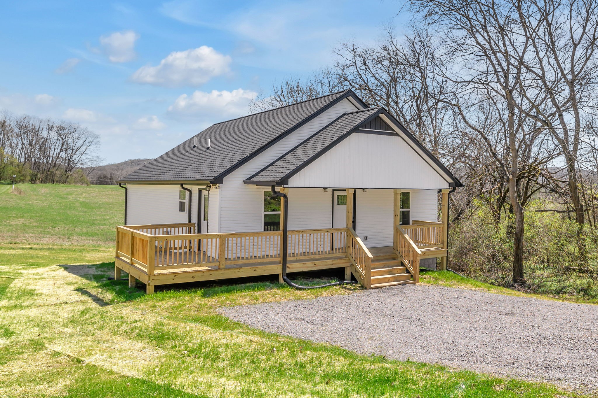 127 Lock 6 Road Hartsville, TN 37074 - Photo 4 of 35 a view of a house with a yard