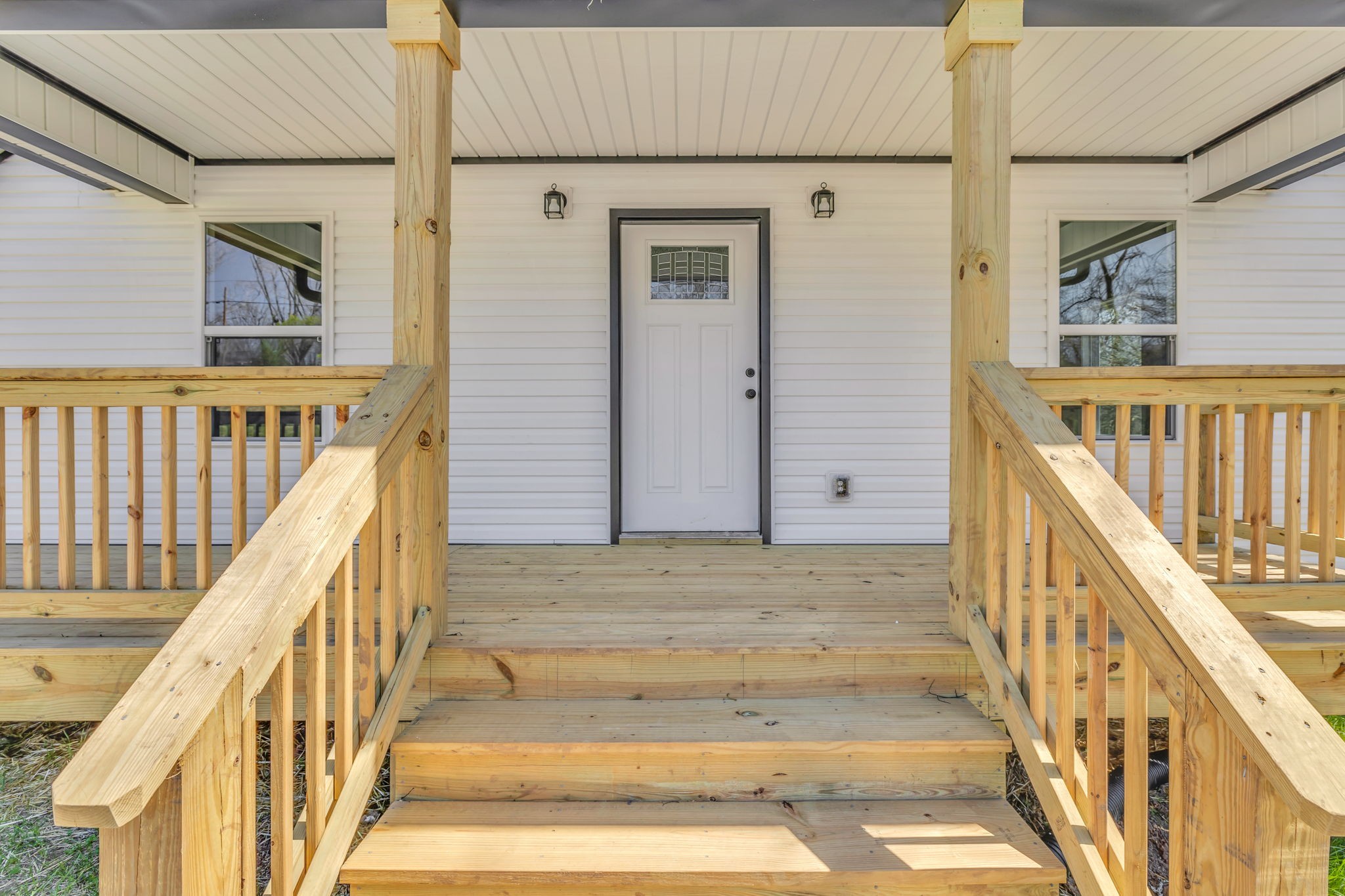 127 Lock 6 Road Hartsville, TN 37074 - Photo 5 of 35 a view of staircase with lots of frames on wall and wooden floor
