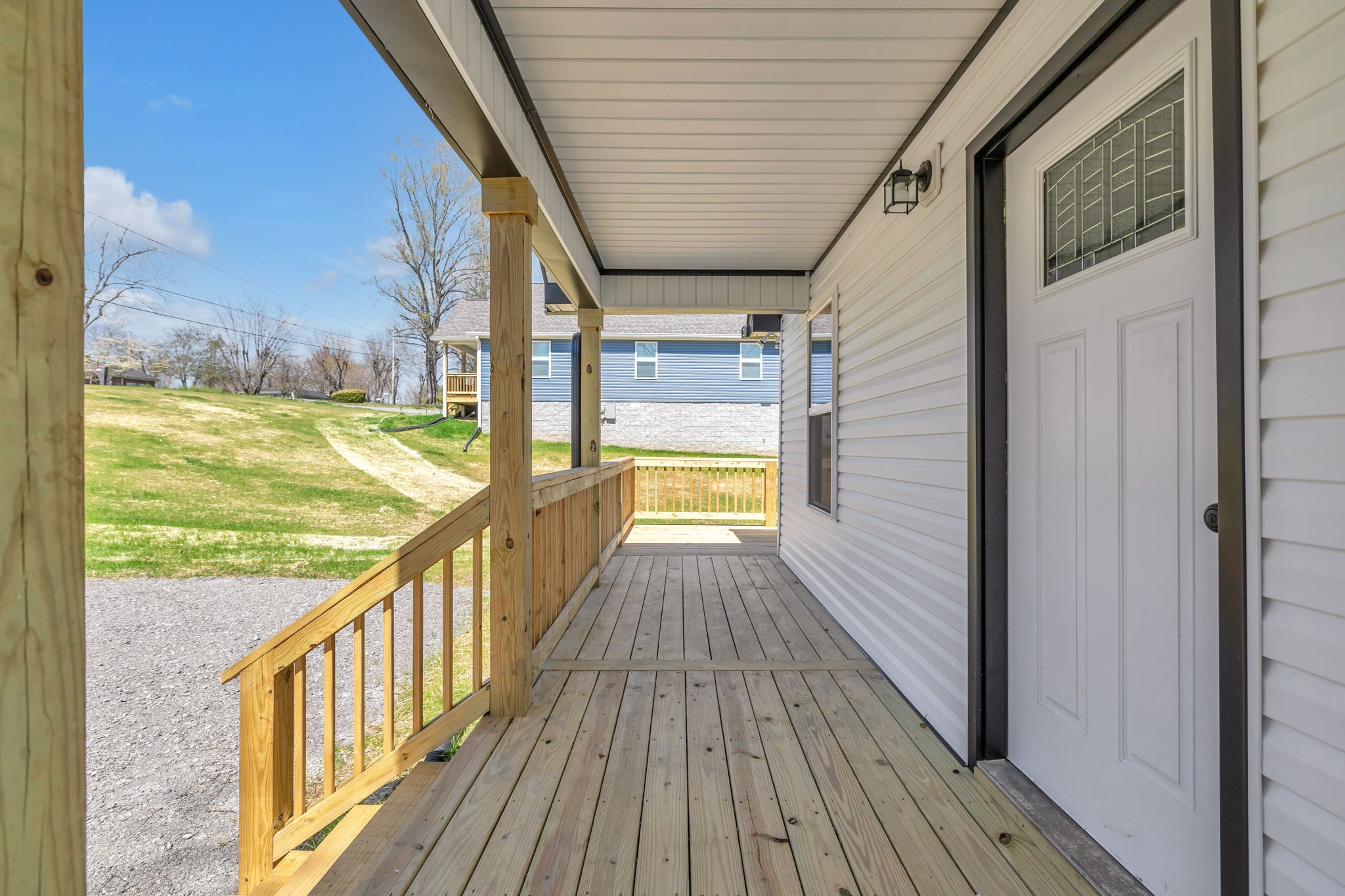 127 Lock 6 Road Hartsville, TN 37074 - Photo 6 of 35 a view of a balcony with wooden floor