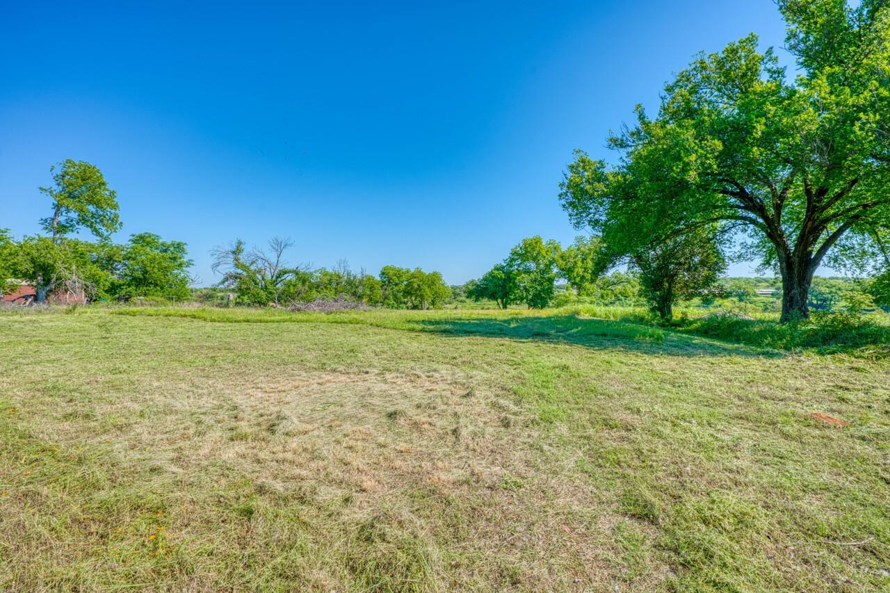 609 East Main Street Llano, TX 78643 - Photo 18 of 23 a view of a field with an trees