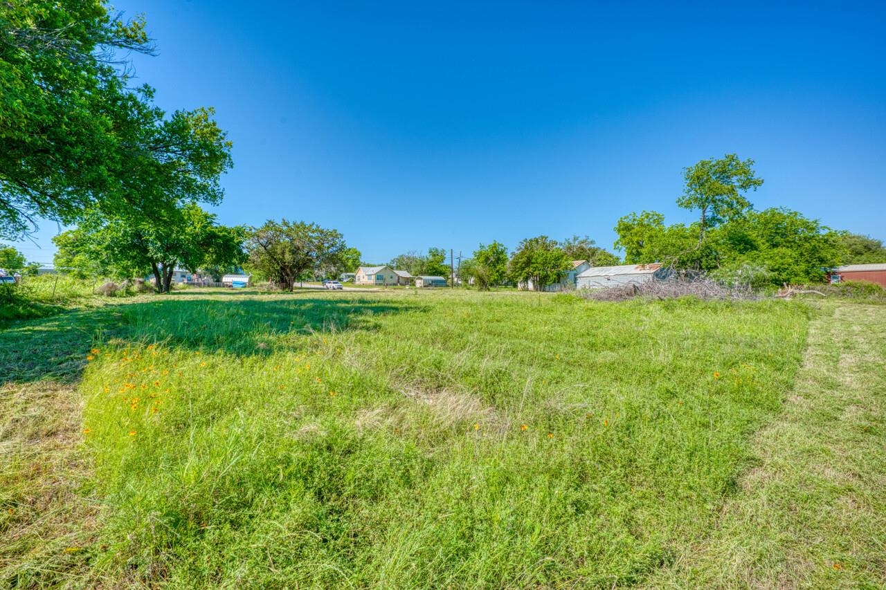 609 East Main Street Llano, TX 78643 - Photo 23 of 23 a view of a garden with a lake