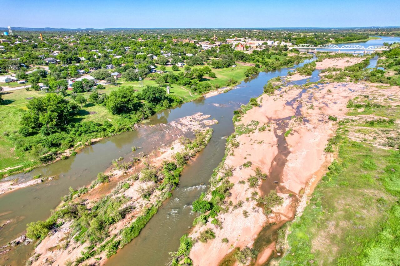 609 East Main Street Llano, TX 78643 - Photo 7 of 23 a view of a lake with a city