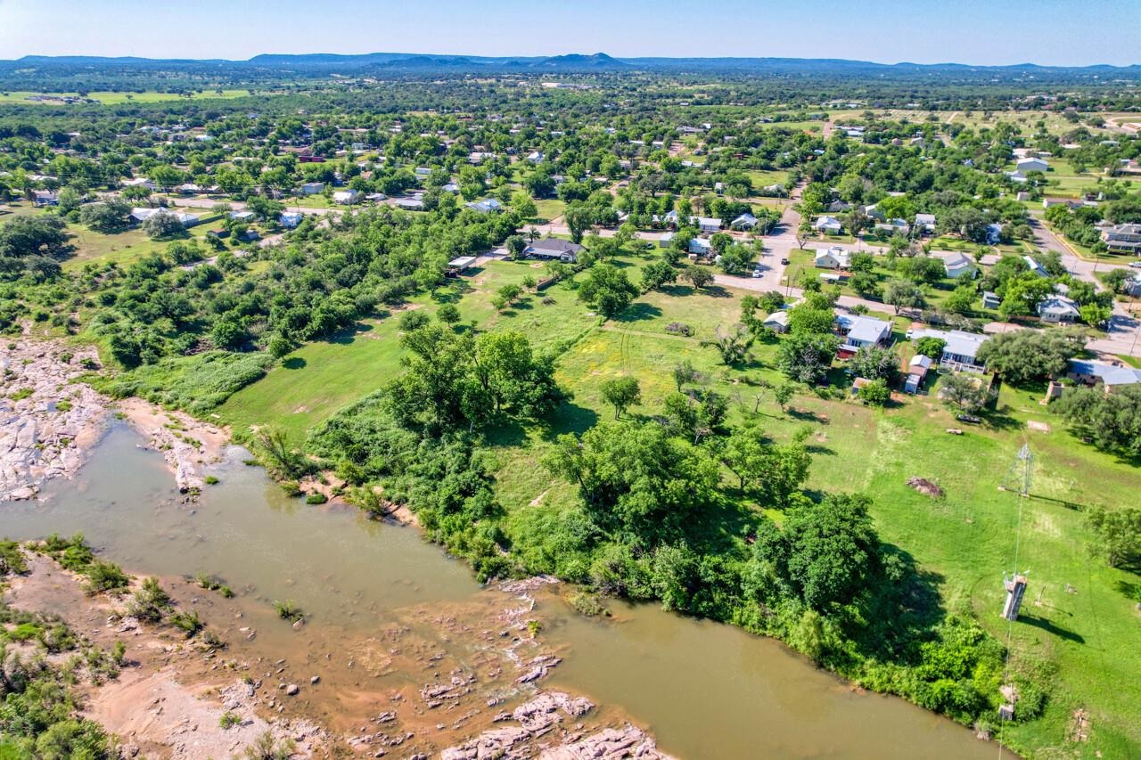 609 East Main Street Llano, TX 78643 - Photo 10 of 23 a view of a lush green field with lots of plants in it