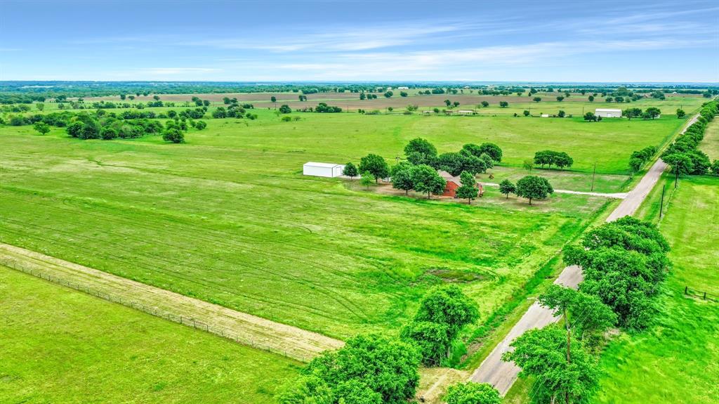 Tbd Airport Road Tioga, TX 76271 - Photo 11 of 28 a view of a green field with lots of green space and car parked