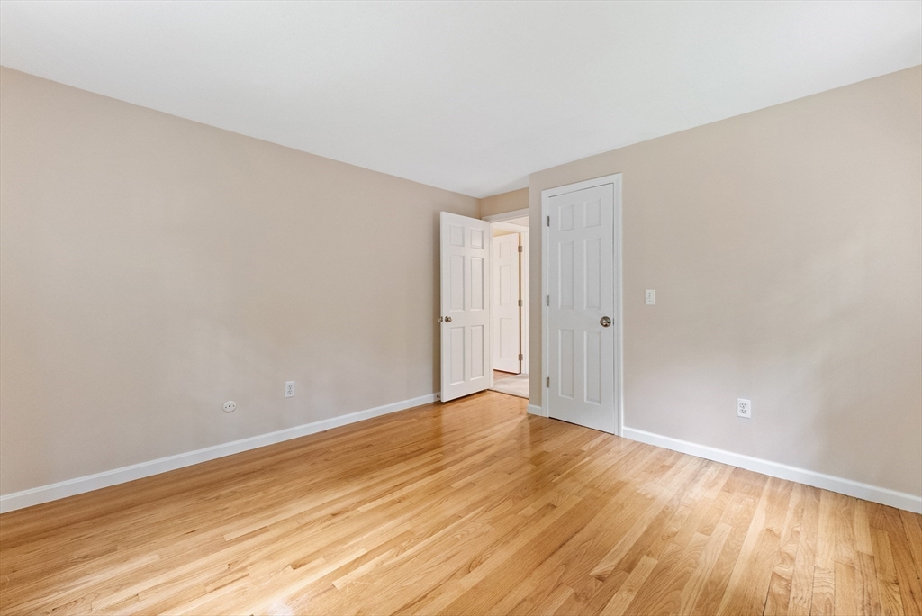 900 Maple Road Longmeadow, MA 01106 - Photo 23 of 42 a view of an empty room with wooden floor