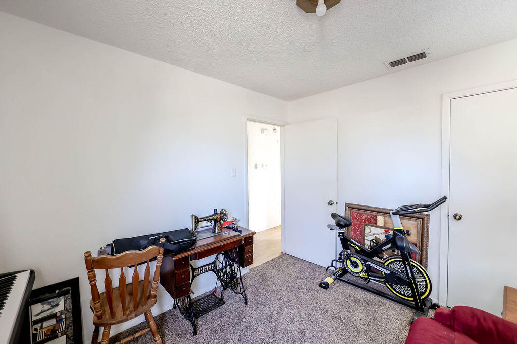 6001 14th Street Lubbock, TX 79416 - Photo 23 of 31 a view of a room with gym equipment