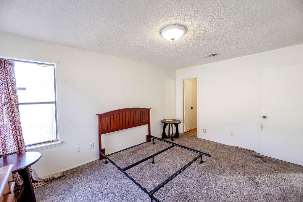 6001 14th Street Lubbock, TX 79416 - Photo 25 of 31 a living room with furniture