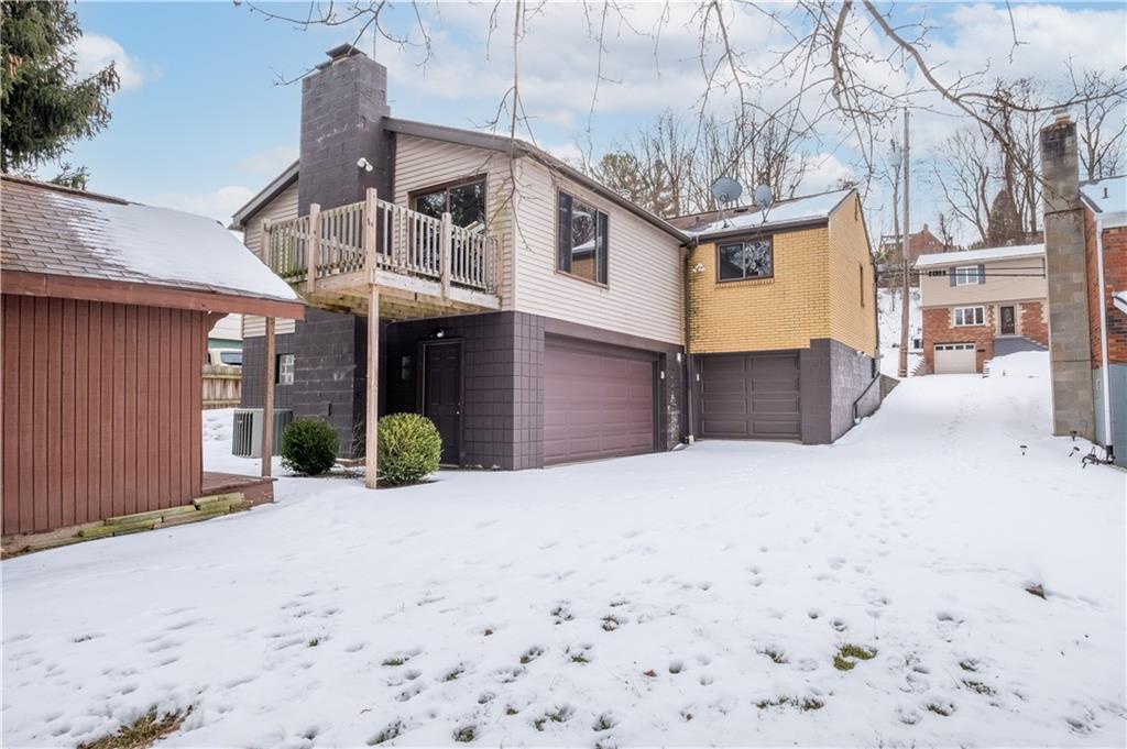 435 Pearce Road Pittsburgh, PA 15234 - Photo 25 of 25 a front view of a house with a yard
