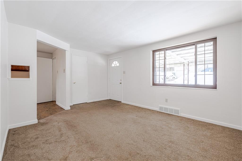435 Pearce Road Pittsburgh, PA 15234 - Photo 3 of 25 an empty room with windows