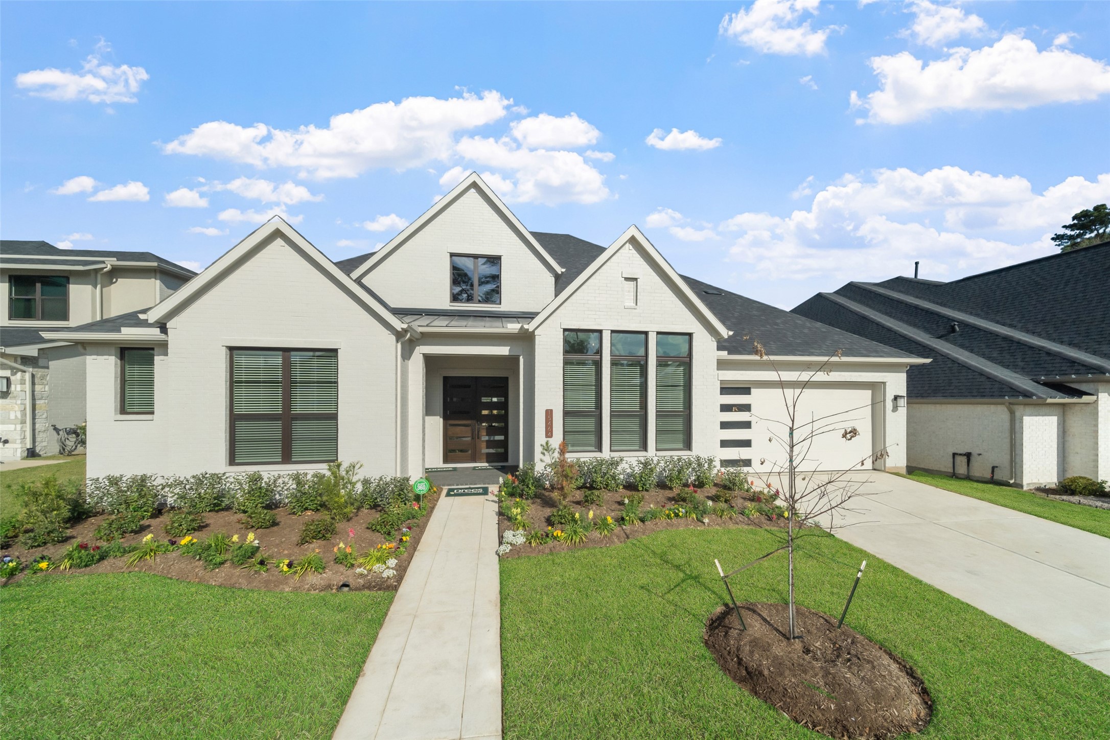 15464 Ringbill Way Magnolia, TX 77354 - Photo 2 of 37 a front view of a house with a yard