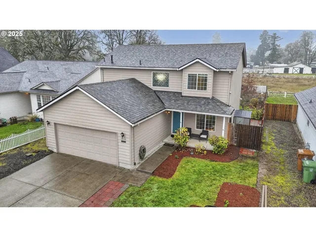 a aerial view of a house with a ocean view