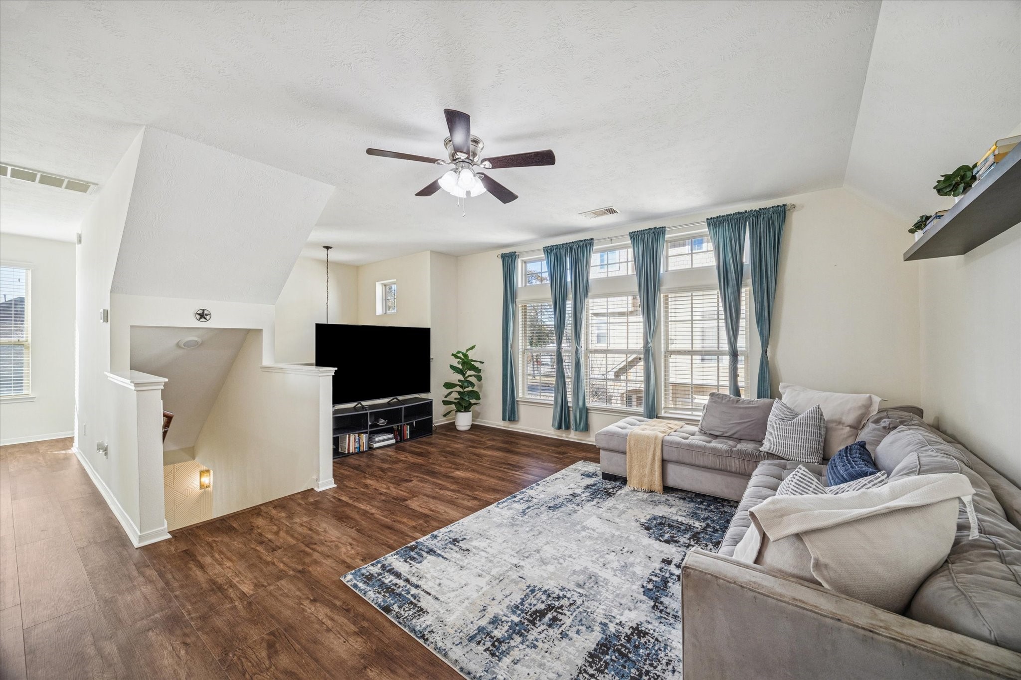 3332 Home Point Drive Houston, TX 77091 - Photo 1 of 26 a living room with furniture and a flat screen tv