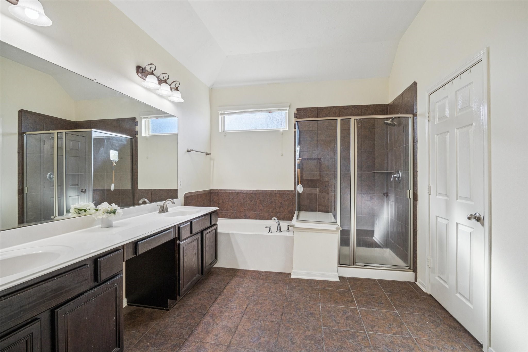 3332 Home Point Drive Houston, TX 77091 - Photo 17 of 26 a bathroom with a tub sink shower and mirror