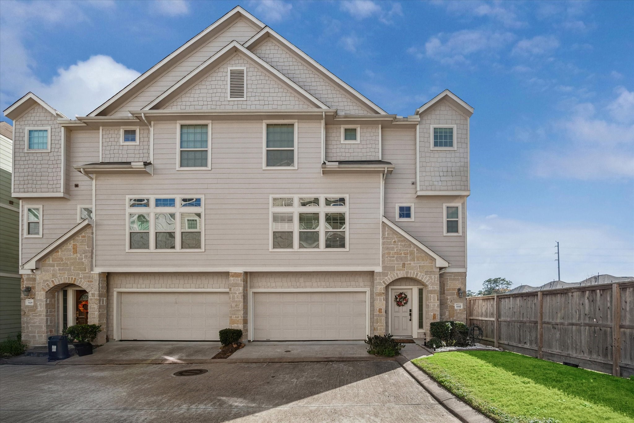 3332 Home Point Drive Houston, TX 77091 - Photo 2 of 26 a front view of a house with a yard