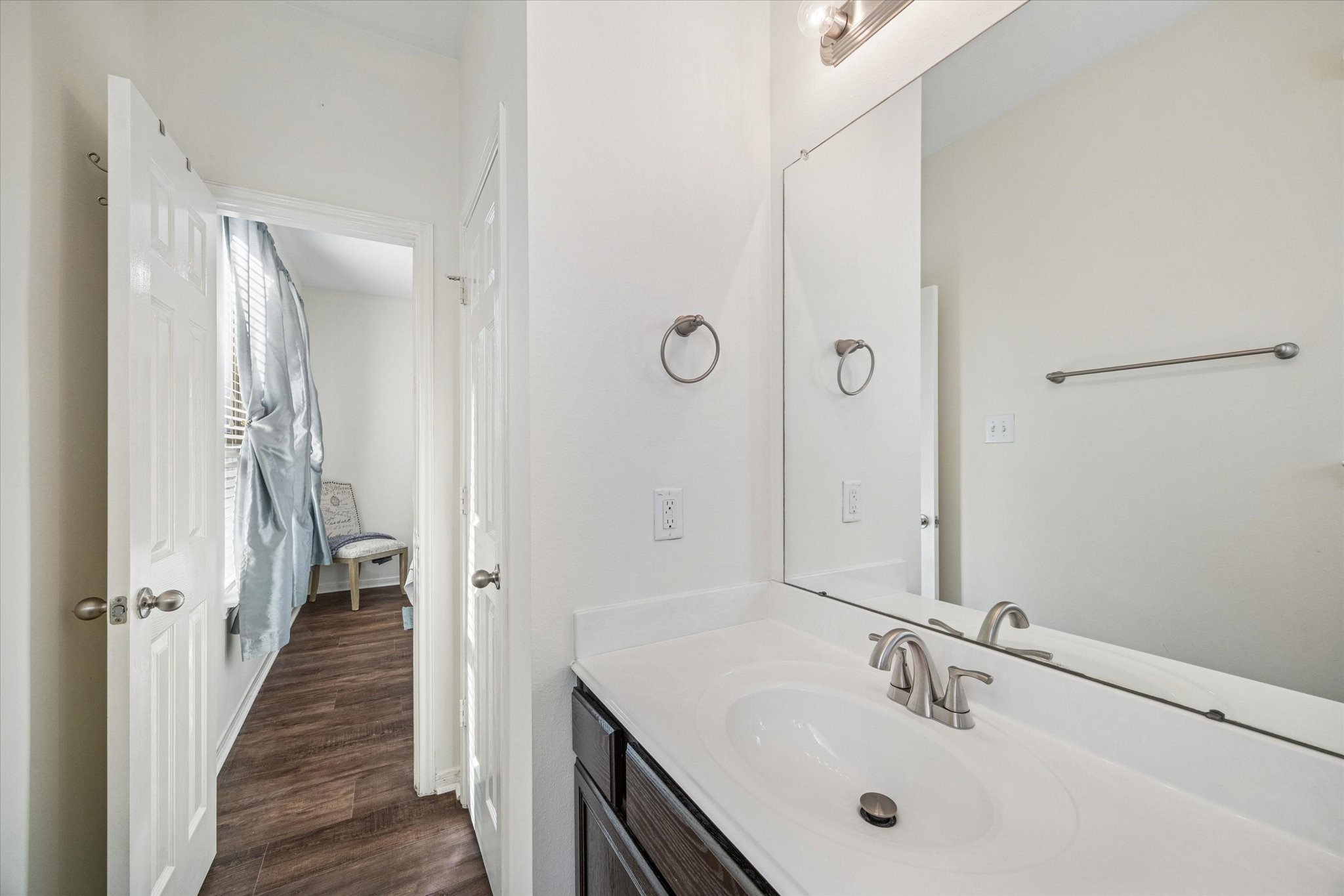 3332 Home Point Drive Houston, TX 77091 - Photo 23 of 26 a bathroom with a sink and a mirror