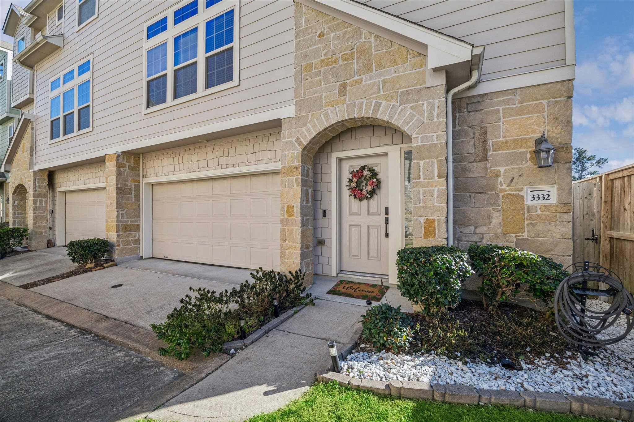 3332 Home Point Drive Houston, TX 77091 - Photo 3 of 26 a front view of a house with garden