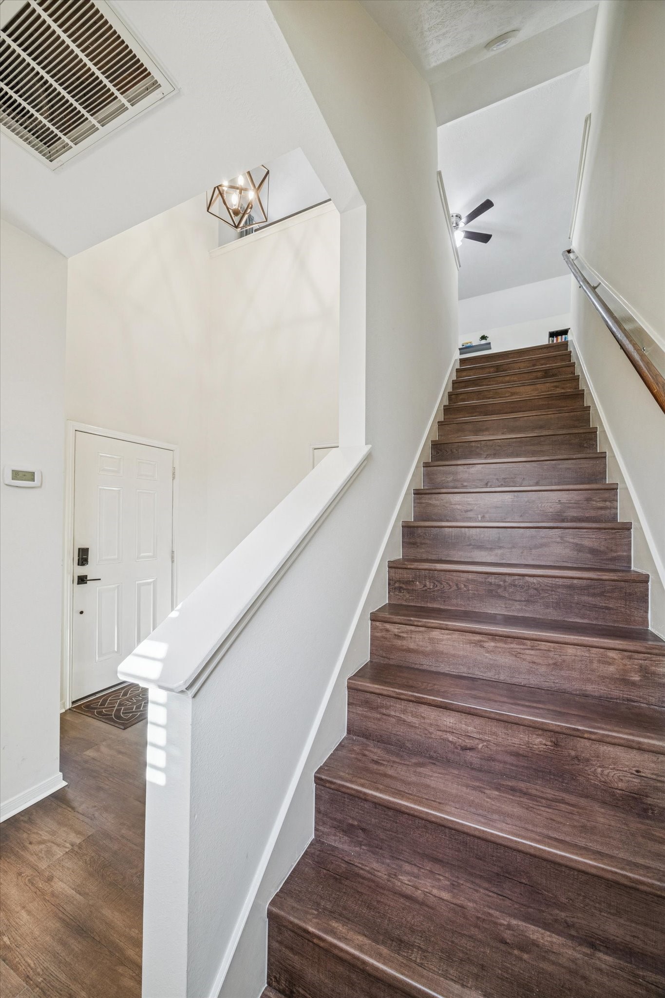 3332 Home Point Drive Houston, TX 77091 - Photo 6 of 26 a view of entryway and hall with wooden floor