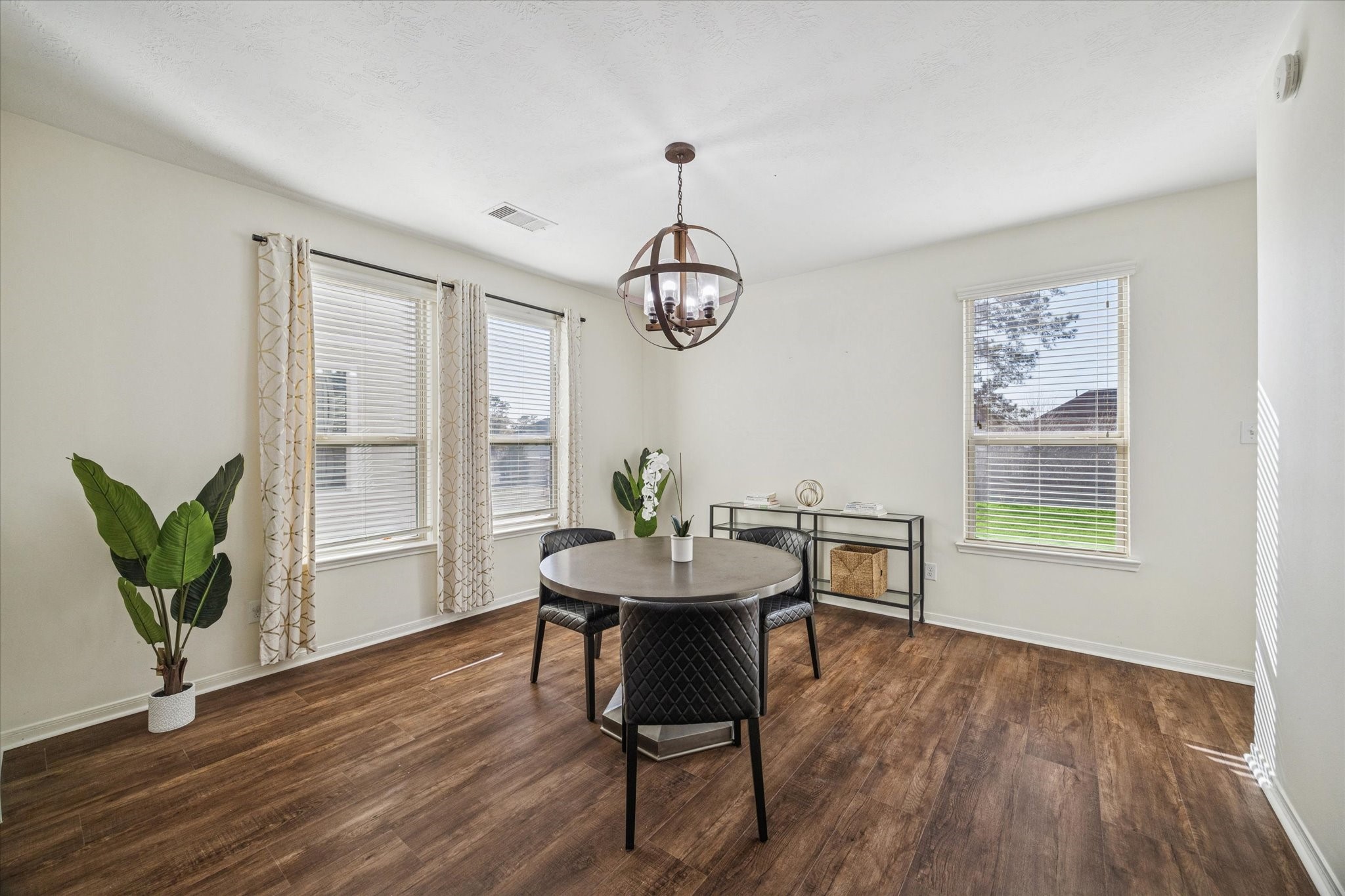 3332 Home Point Drive Houston, TX 77091 - Photo 7 of 26 a view of a dining room with furniture window and wooden floor