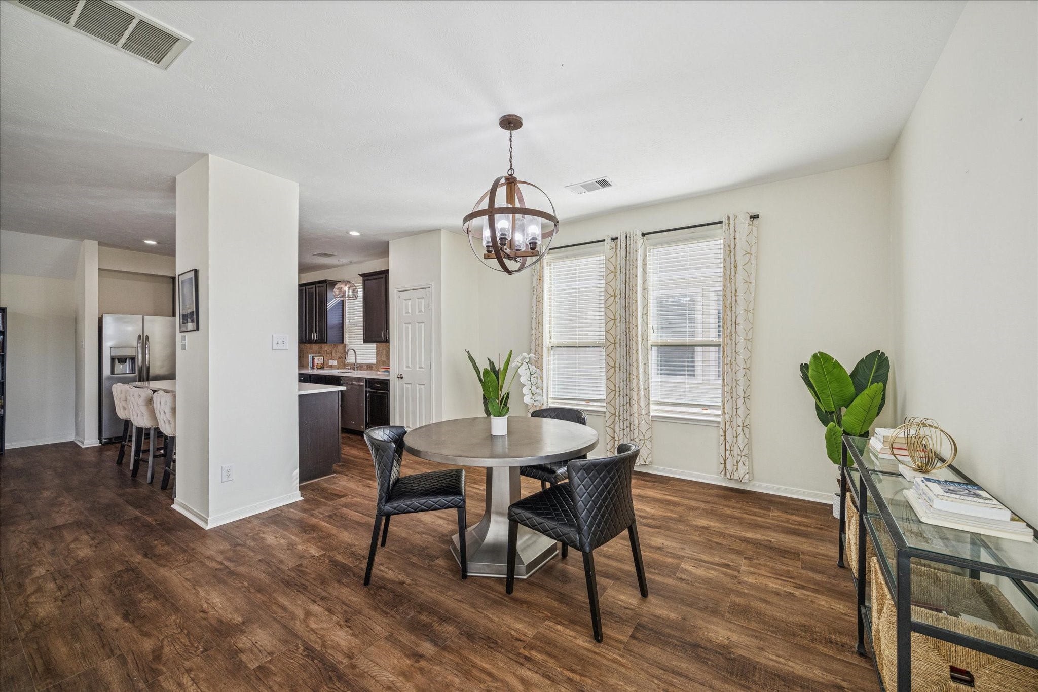 3332 Home Point Drive Houston, TX 77091 - Photo 8 of 26 a view of a dining room with furniture window and wooden floor
