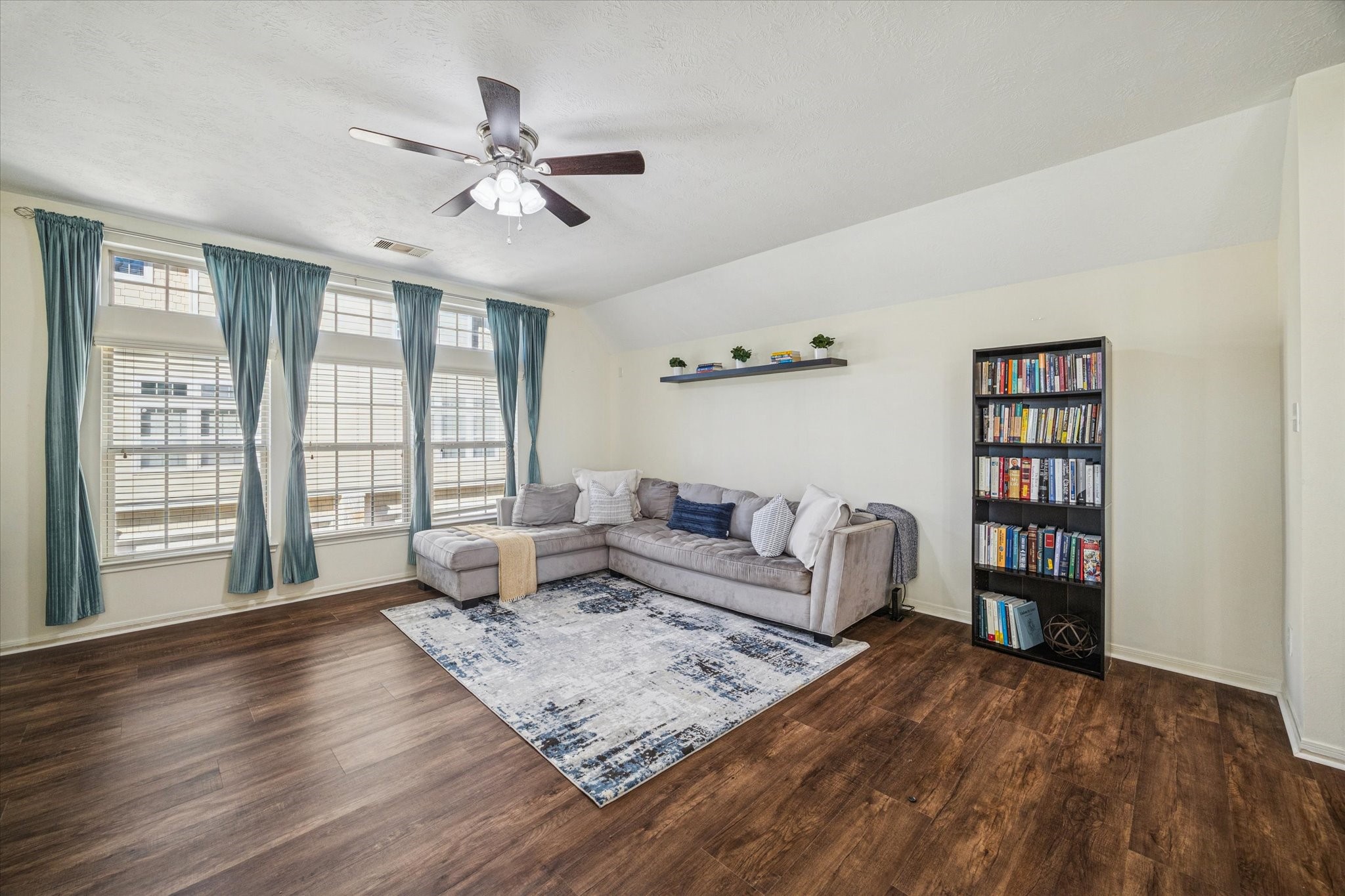 3332 Home Point Drive Houston, TX 77091 - Photo 9 of 26 a living room with furniture and a large window