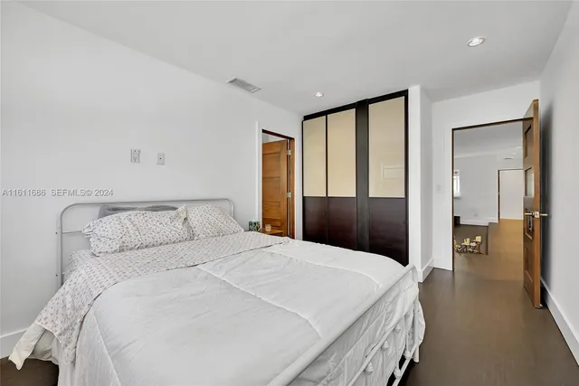 a bathroom with a sink a toilet and tub