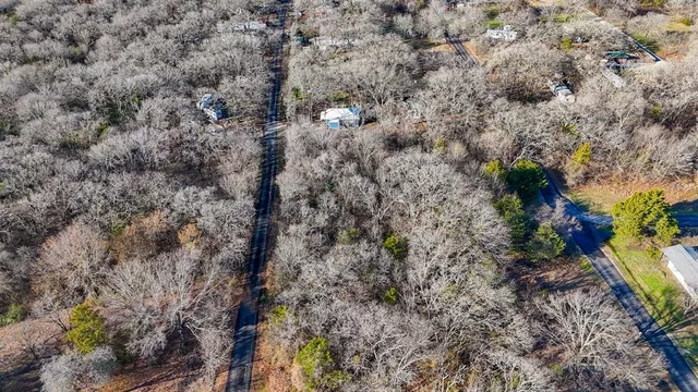 a view of a backyard of the house