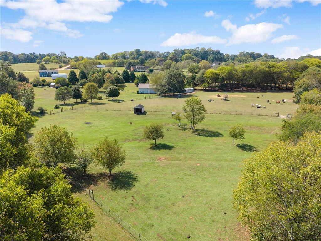 241 Bill Watkins Road Hoschton, GA 30548 - Photo 19 of 22 a view of a lake with a mountain