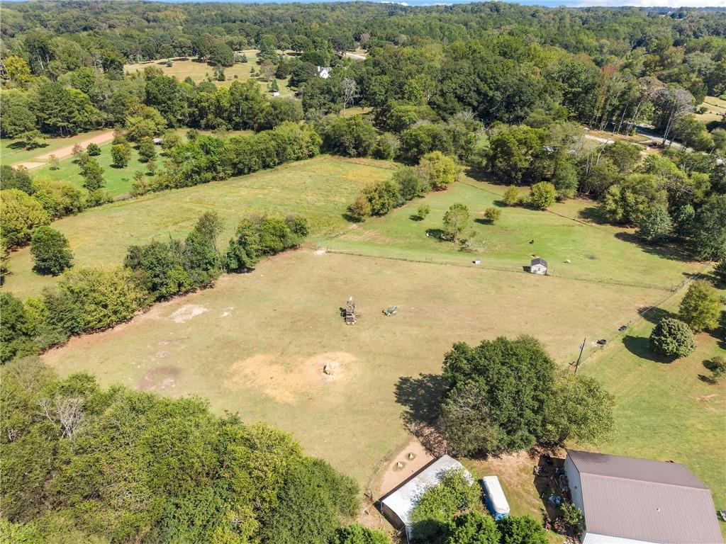 241 Bill Watkins Road Hoschton, GA 30548 - Photo 3 of 22 an aerial view of a houses with yard