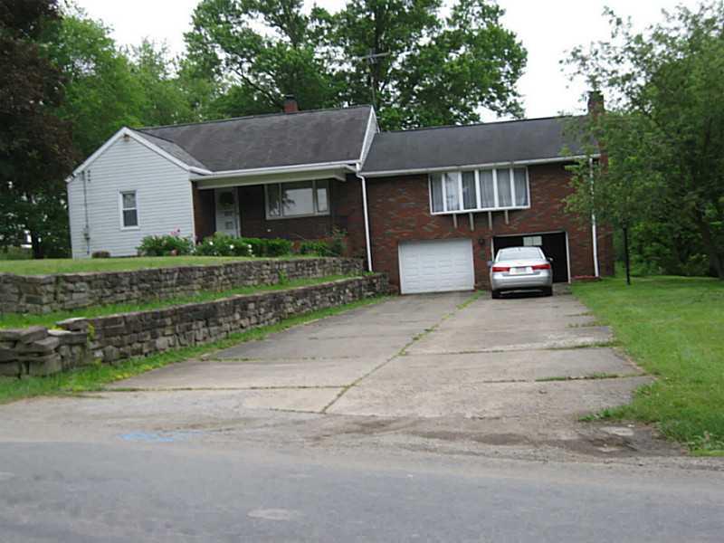 167 Broadview Road New Stanton, PA 15639 - Photo 1 of 11 Exterior Front. This 64 year old home has been well maintained and offers B 1 zoning in New Stanton on a country road.Wide concrete driveway and two car oversized integral garage
