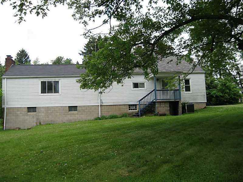 167 Broadview Road New Stanton, PA 15639 - Photo 11 of 11 Exterior Back. Nicely sized back yard with large tree.