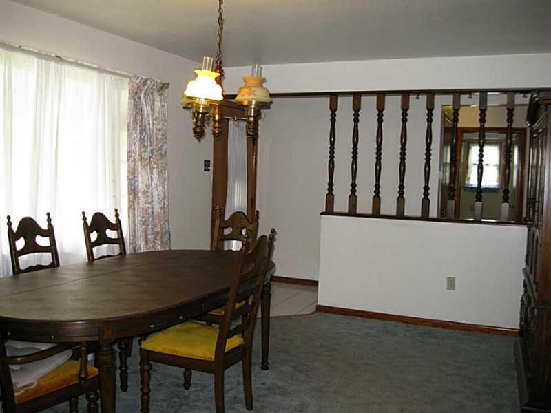 167 Broadview Road New Stanton, PA 15639 - Photo 3 of 11 Dining Room. Huge dining room with hardwood floors under the carpet. Large front window.
