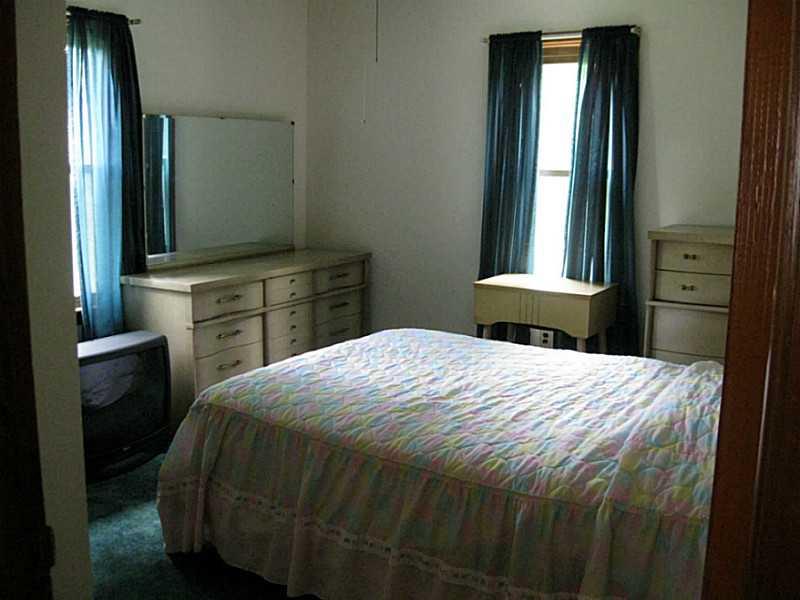 167 Broadview Road New Stanton, PA 15639 - Photo 10 of 11 Bedroom. 1st floor bedroom. double closet and hardwood under carpeting.