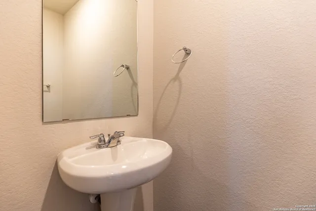 a sink with a mirror