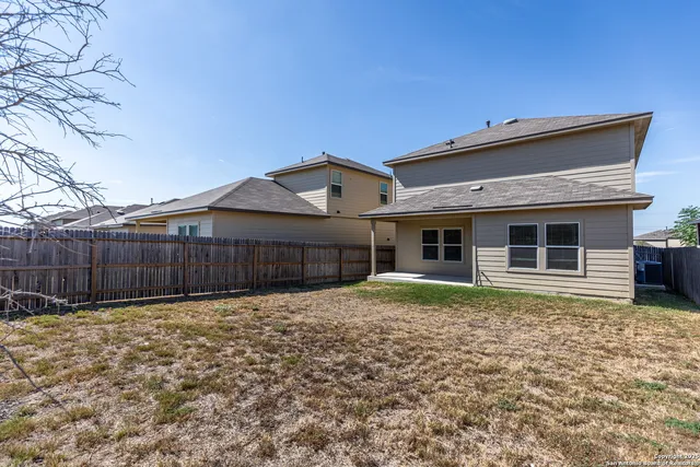 a picture of a bathroom with a shower