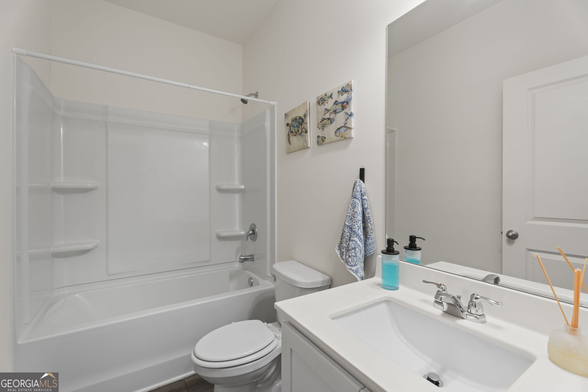 119 Bantry Way Locust Grove, GA 30248 - Photo 12 of 34 a bathroom with a sink toilet and shower