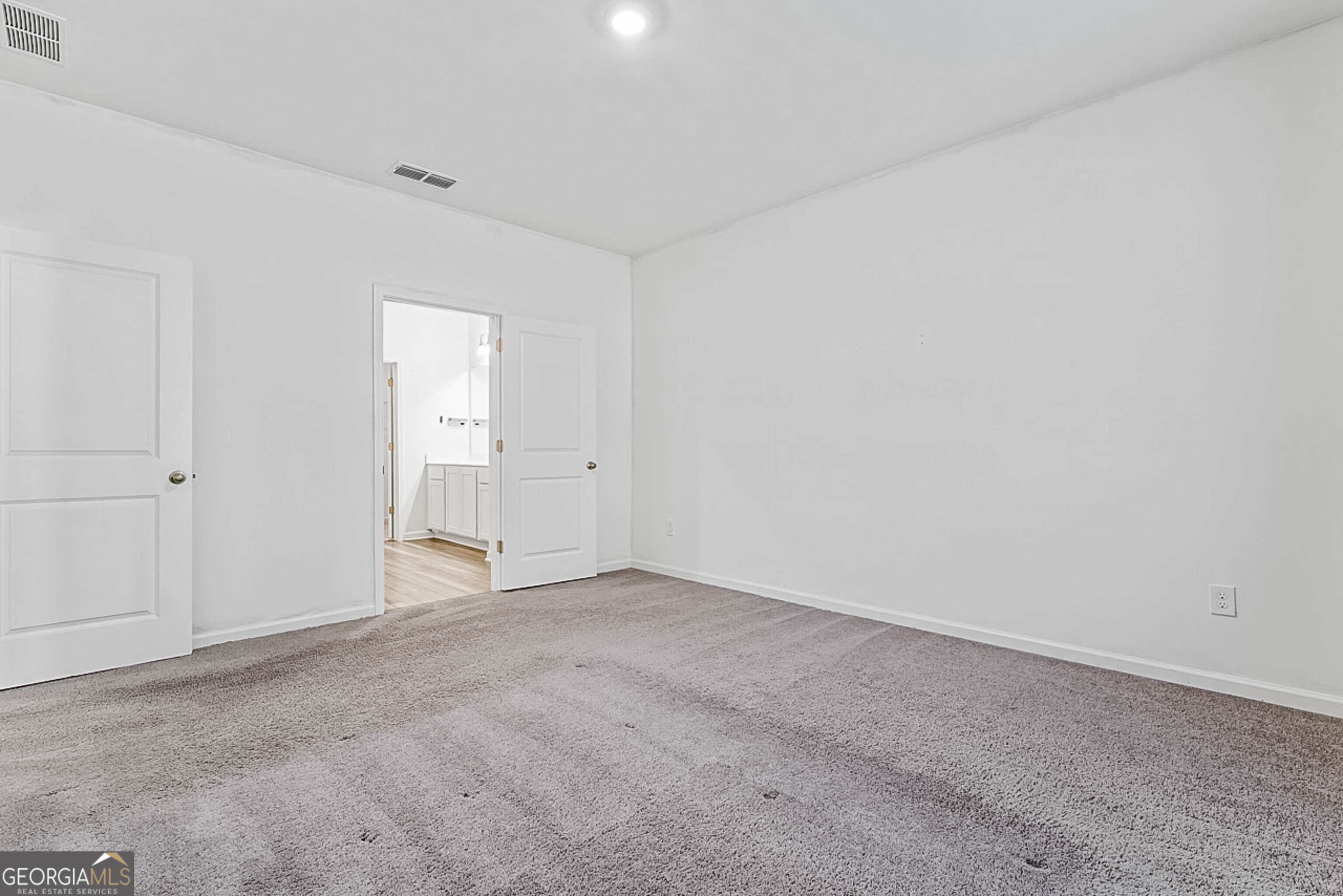 119 Bantry Way Locust Grove, GA 30248 - Photo 23 of 34 an empty room with an entryway