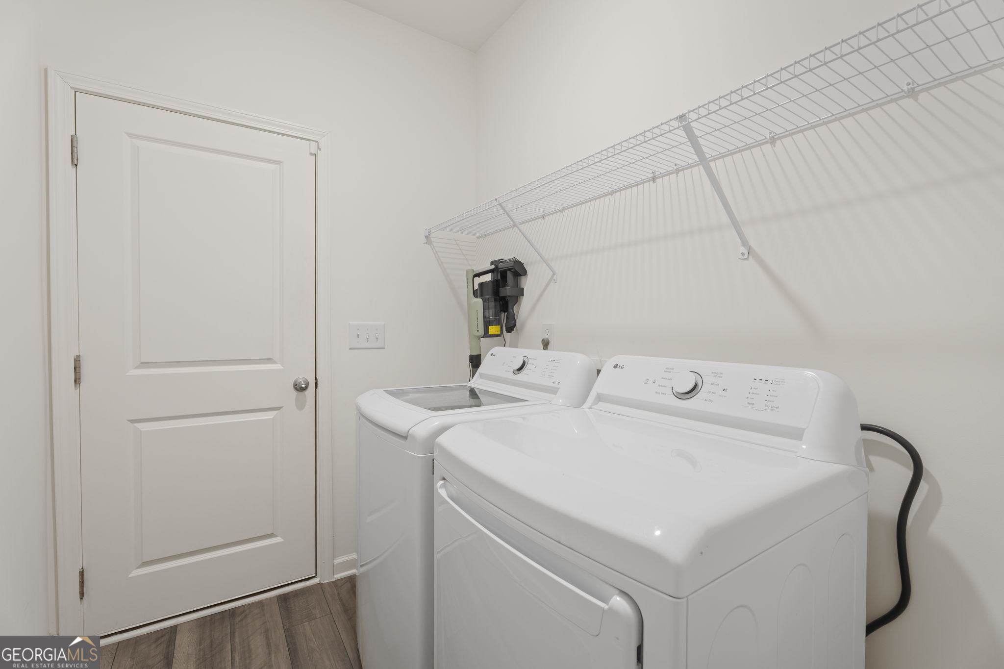 119 Bantry Way Locust Grove, GA 30248 - Photo 24 of 34 a utility room with dryer and washer