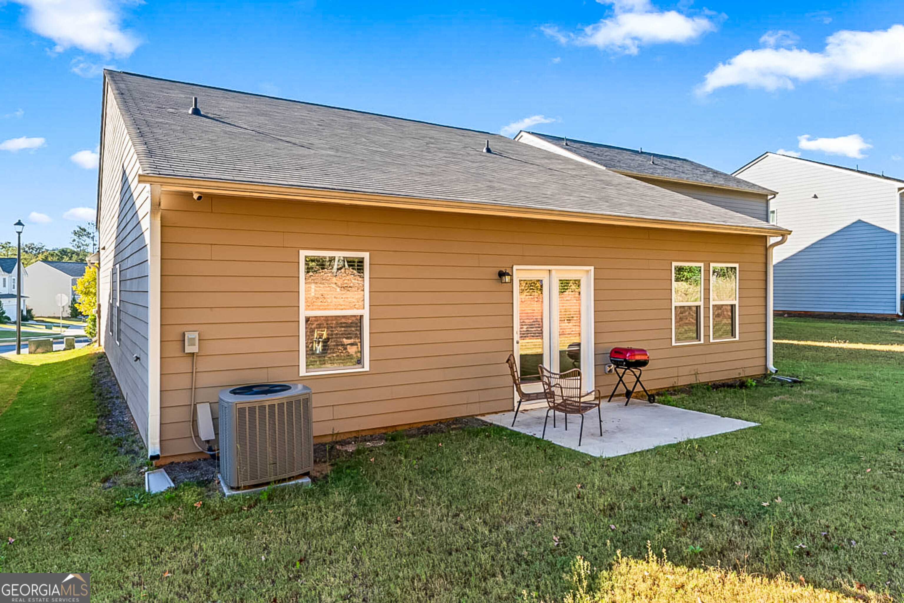 119 Bantry Way Locust Grove, GA 30248 - Photo 26 of 34 a front view of house with a garden