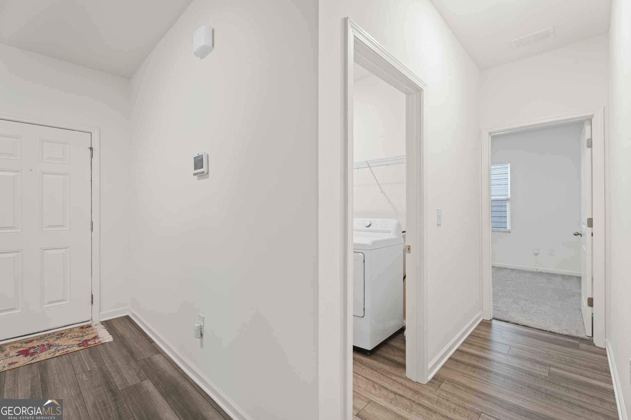 119 Bantry Way Locust Grove, GA 30248 - Photo 3 of 34 a view of a room with wooden floor