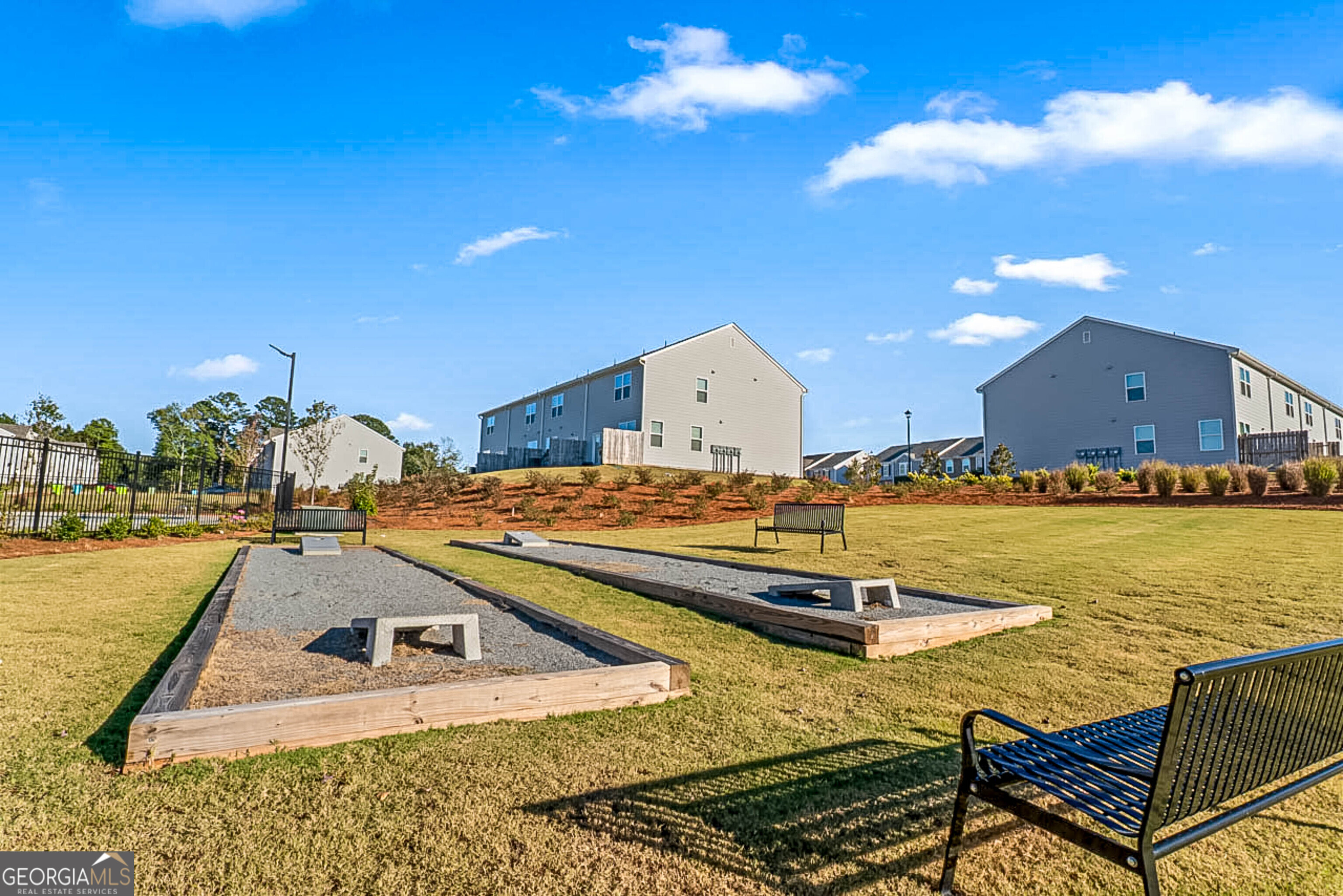 119 Bantry Way Locust Grove, GA 30248 - Photo 32 of 34 a view of a swimming pool with outdoor seating