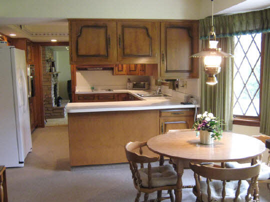 1210 Sequoia Road Rockford, IL 61108 - Photo 2 of 11 a kitchen with stainless steel appliances granite countertop a sink and a refrigerator