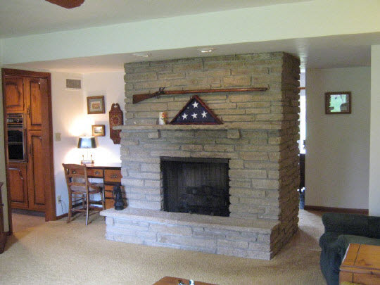 1210 Sequoia Road Rockford, IL 61108 - Photo 4 of 11 a living room with furniture and a fireplace